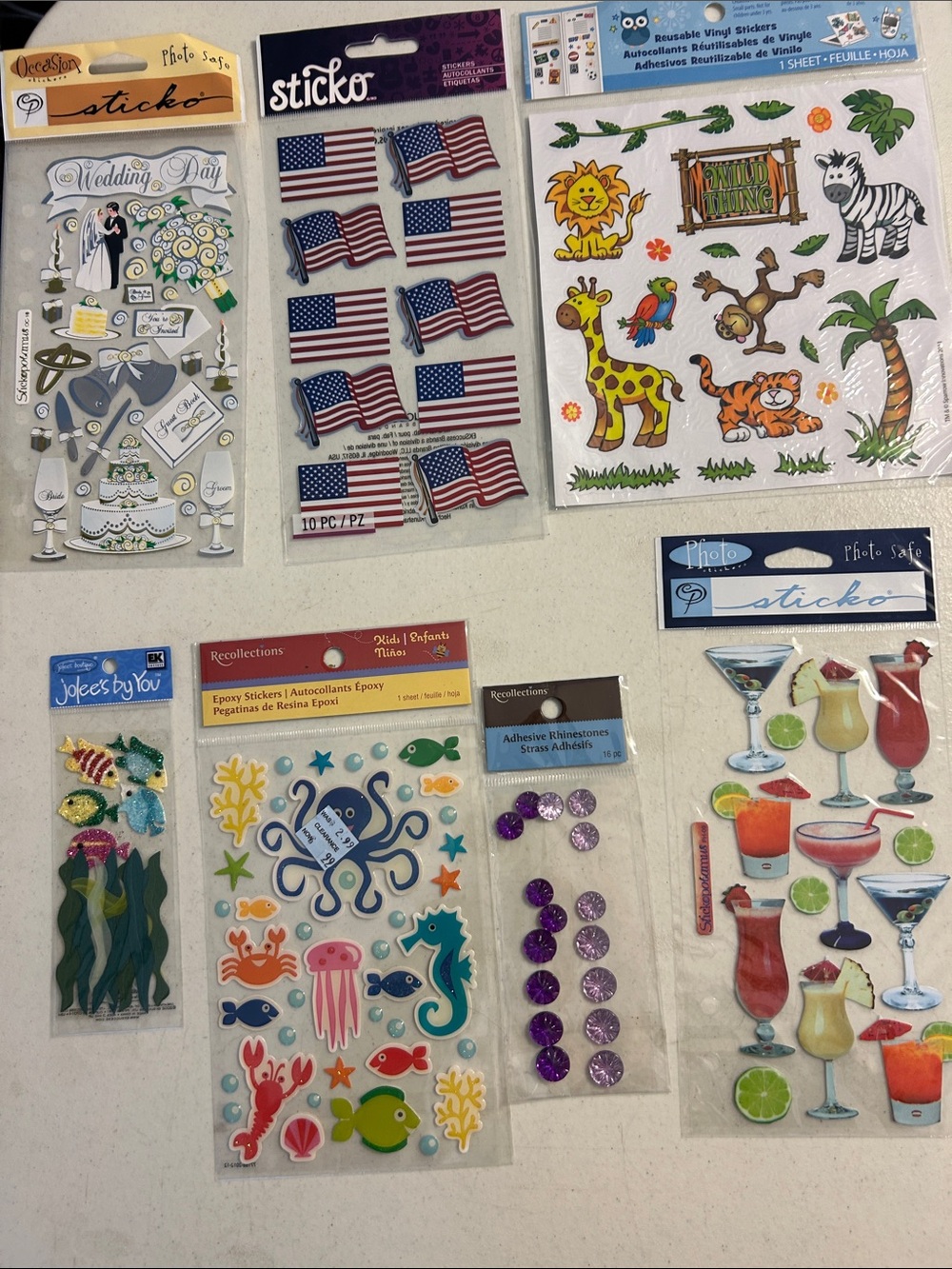Lot of 10 unopened sticker packs.
